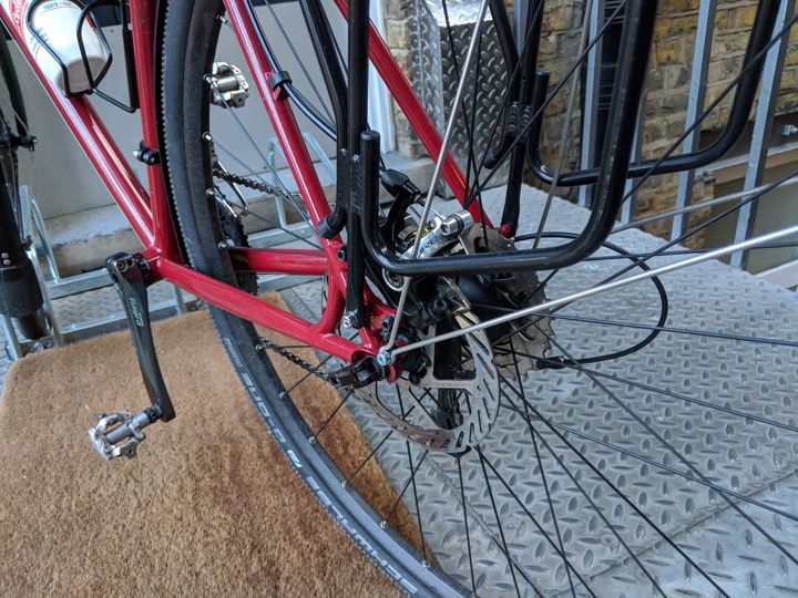 A tight squeeze with caliper, racks and guards